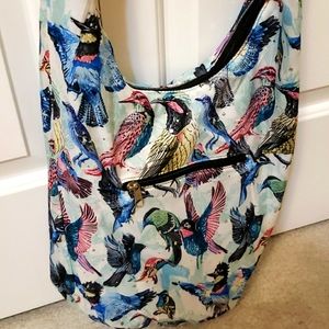 Cotton print bag with denim trim.  Bird print with sequin detail.
